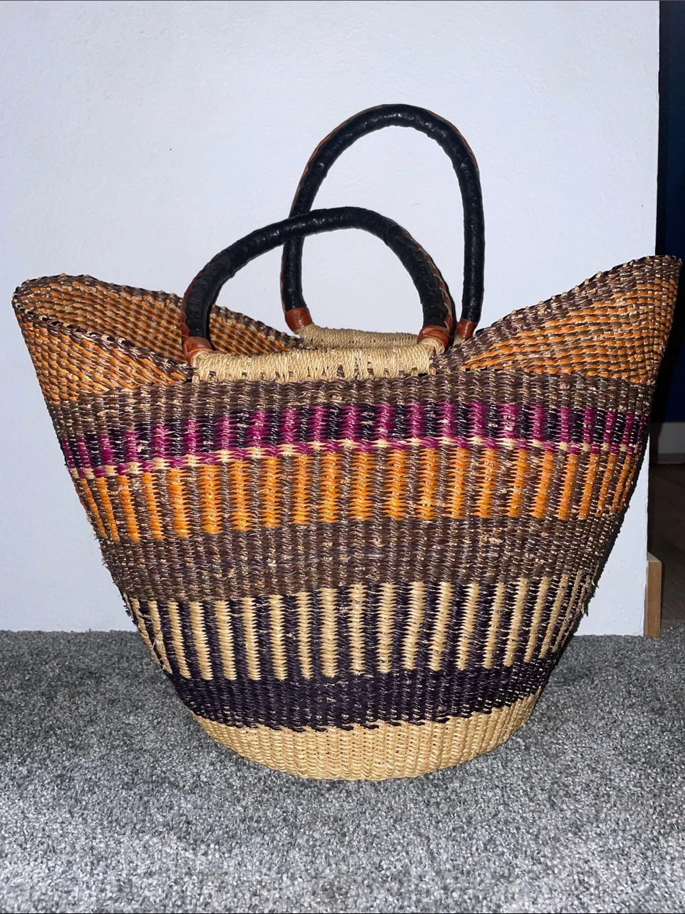 handwoven U-shaped Bolga basket (or market tote) from Ghana